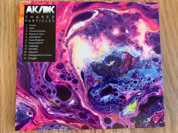 AK/DK - Shared Particles